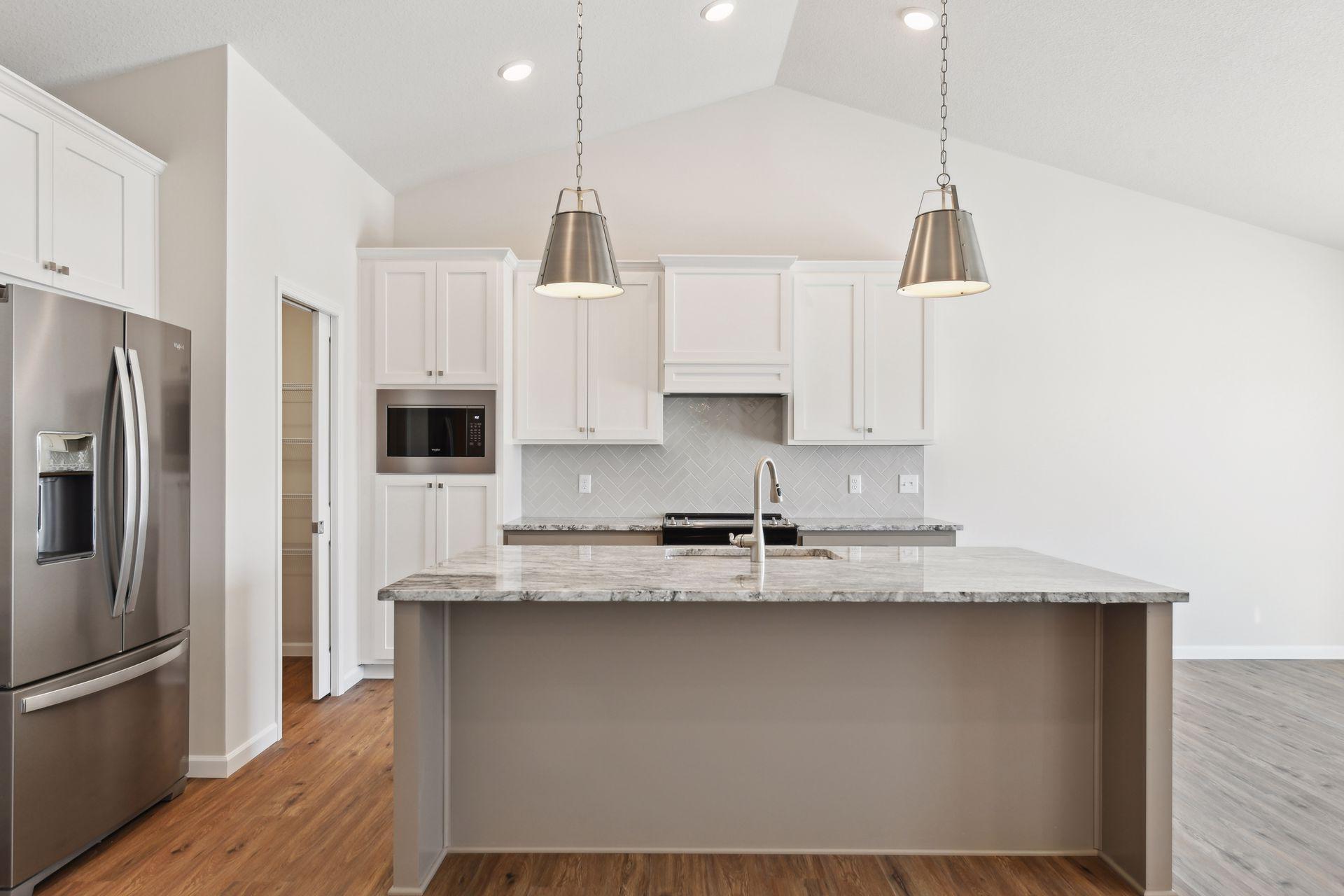 Photo is of a different home (same model) - colors and selections may vary.