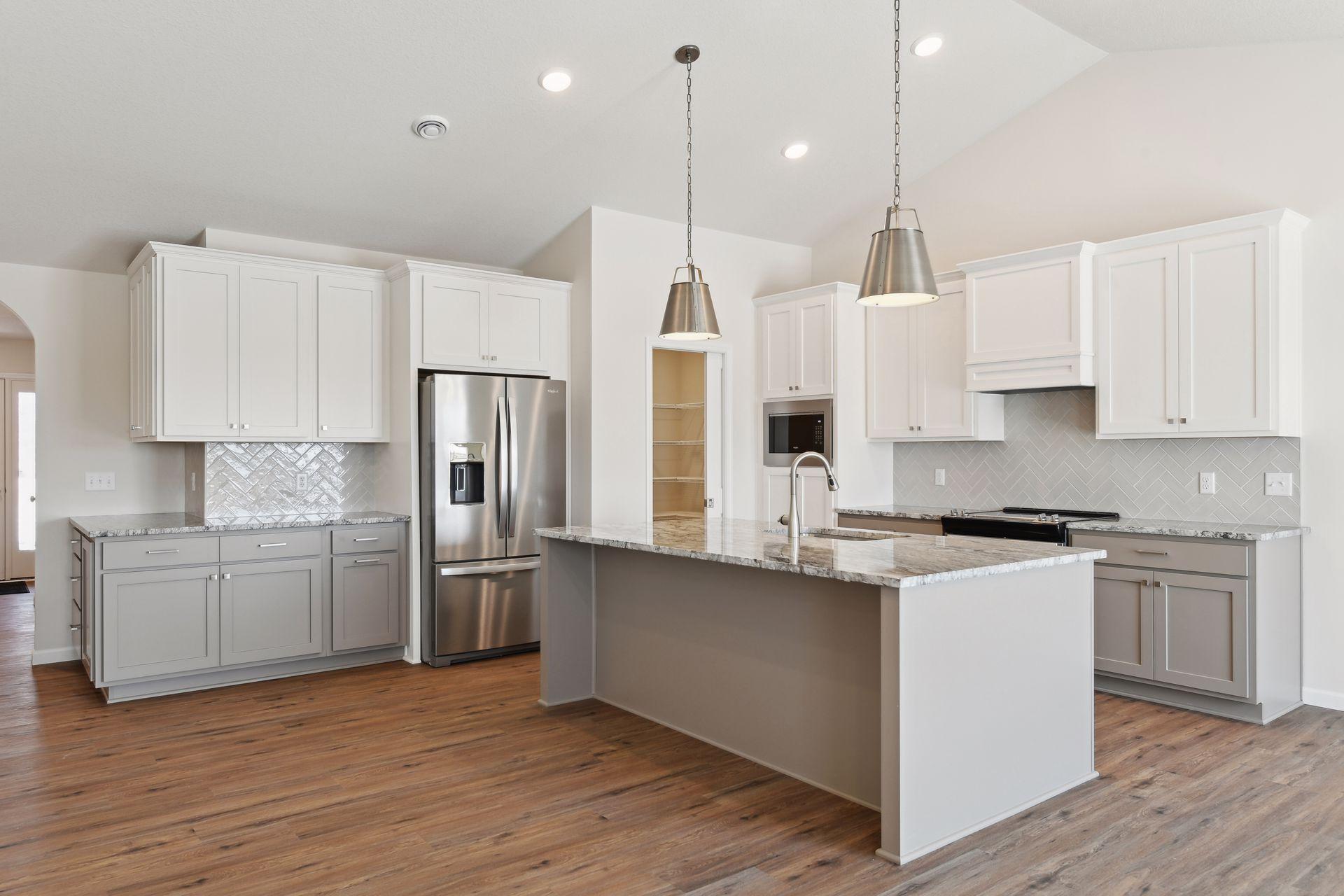 Photo is of a different home (same model) - colors and selections may vary.