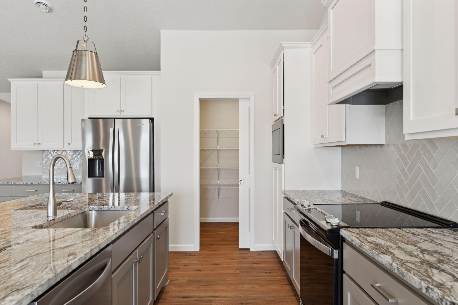 Photo is of a different home (same model) - colors and selections may vary.