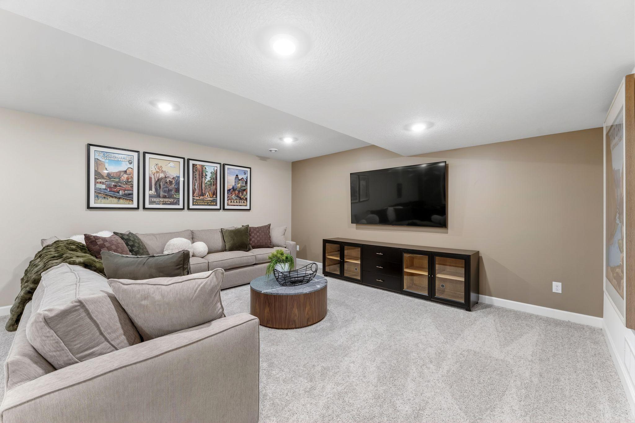 (Photo of decorated model, actual home's finishes will vary) Secondary bedroom with a spacious closet.