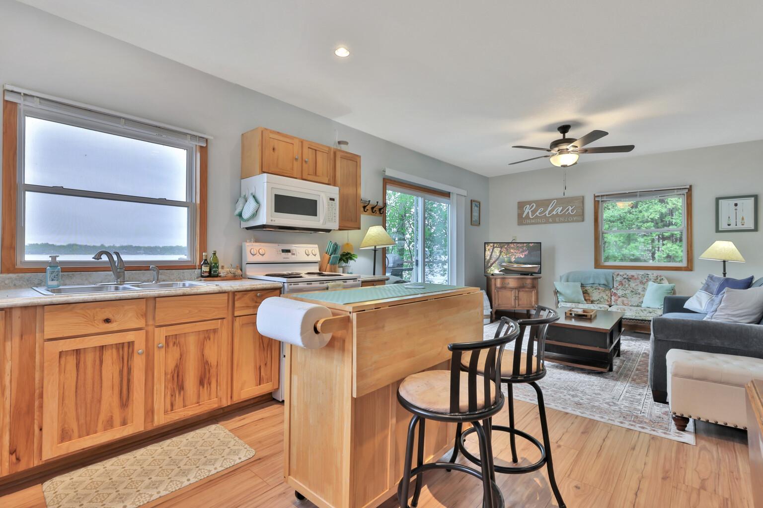 Natural wood work, neutral decor, ready to enjoy the summer fun!