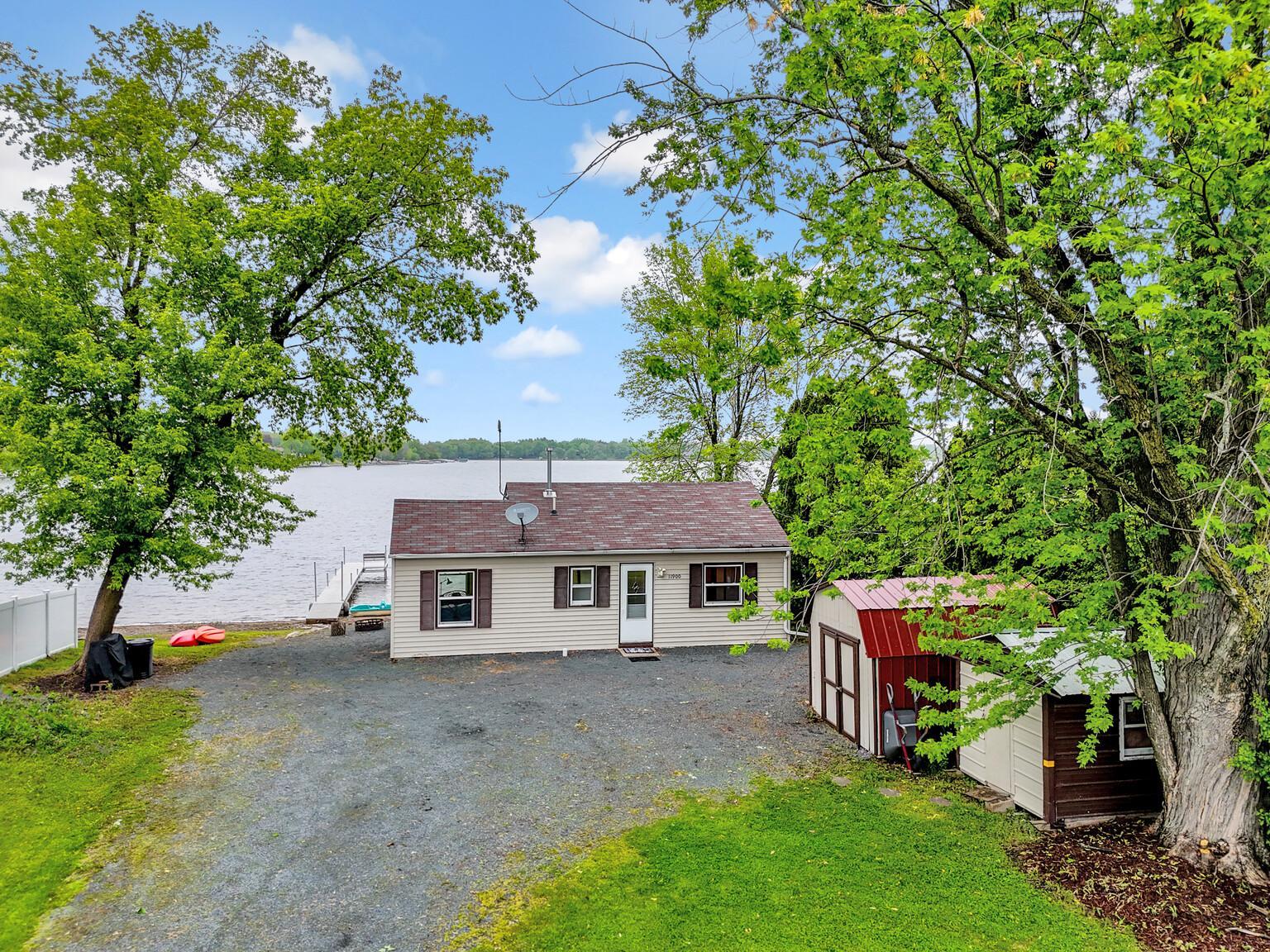 Cozy year round cabin, currently used for VRBO and Airbnb Vacation Investment Property. 2 storage sheds for the toys.