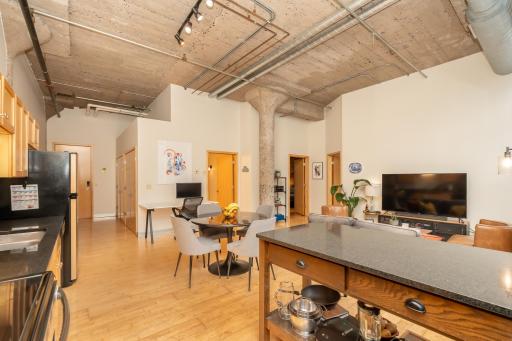 Views from your kitchen into the entryway, living space, bathroom and both bedrooms