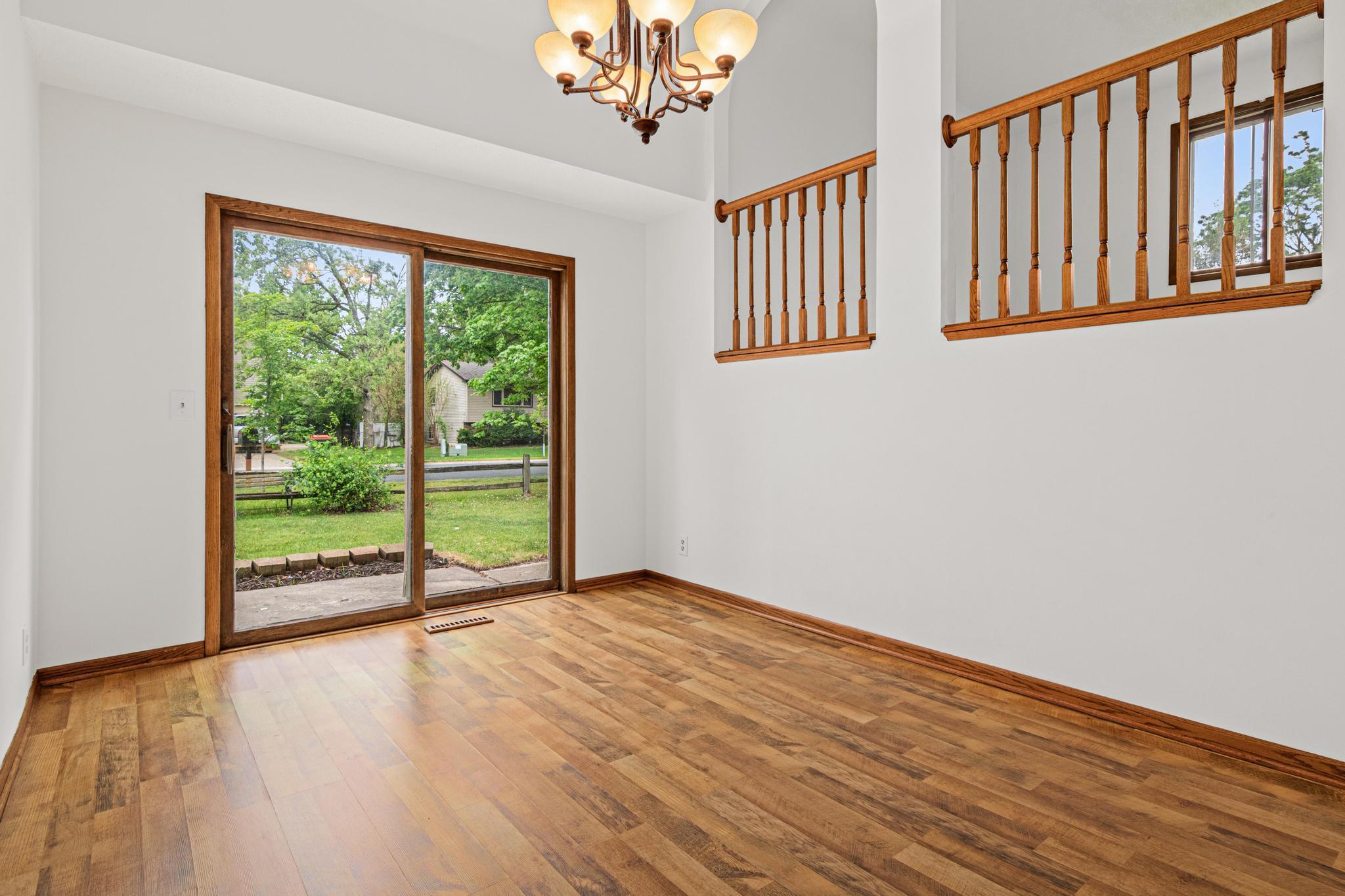 Large dining area with slider door system to the patio.