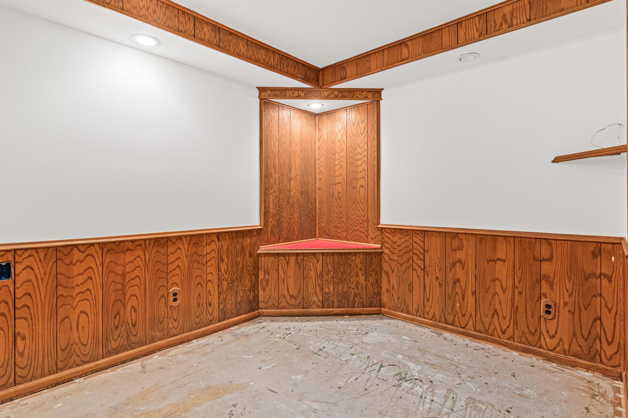 Lower level room used as an office with so much potential.