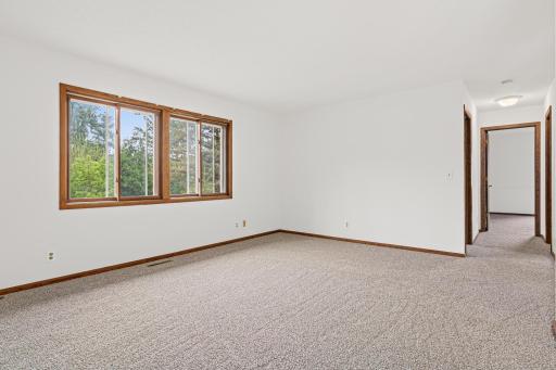 Another view of the living room as you enter the hallway to bedrooms.