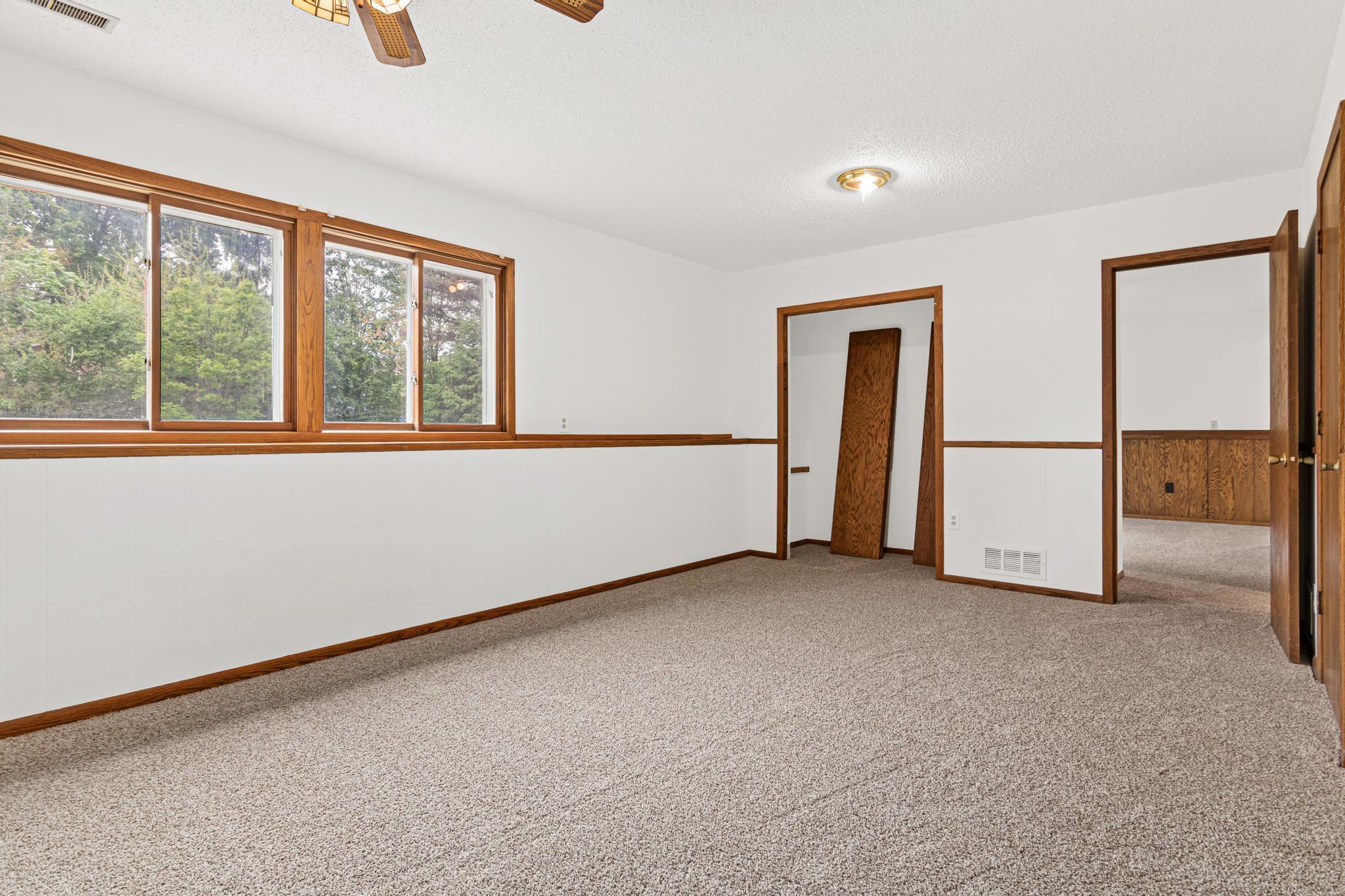 The other side of the family room with storage closet.