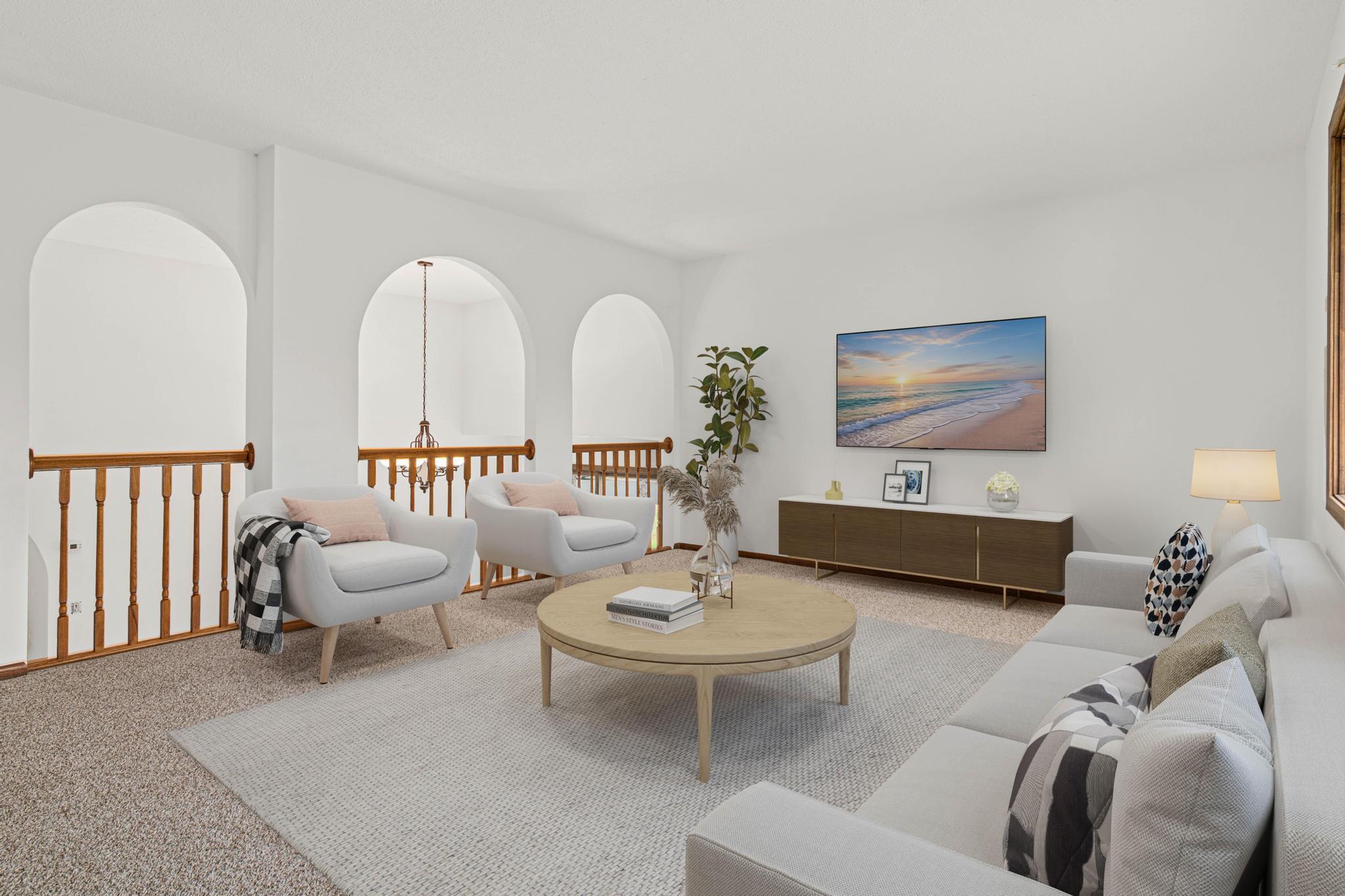 Virtually staged upper level living room.