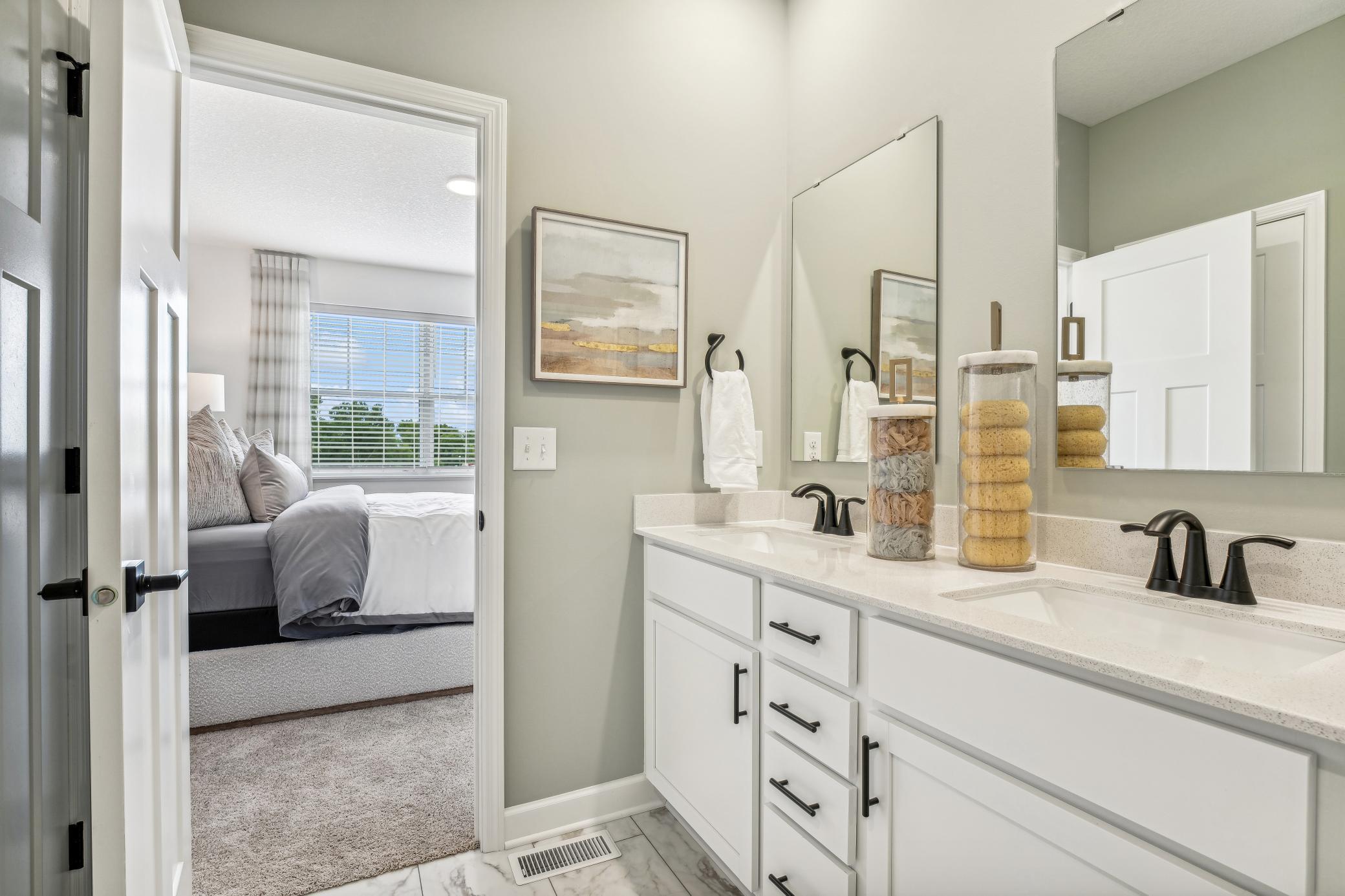 (Photo of a decorated model, actual homes finishes will vary) The primary bath.
