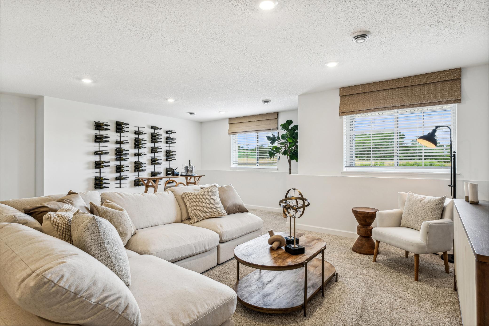 (Photo of a decorated model, actual homes finishes will vary) The recreation room.