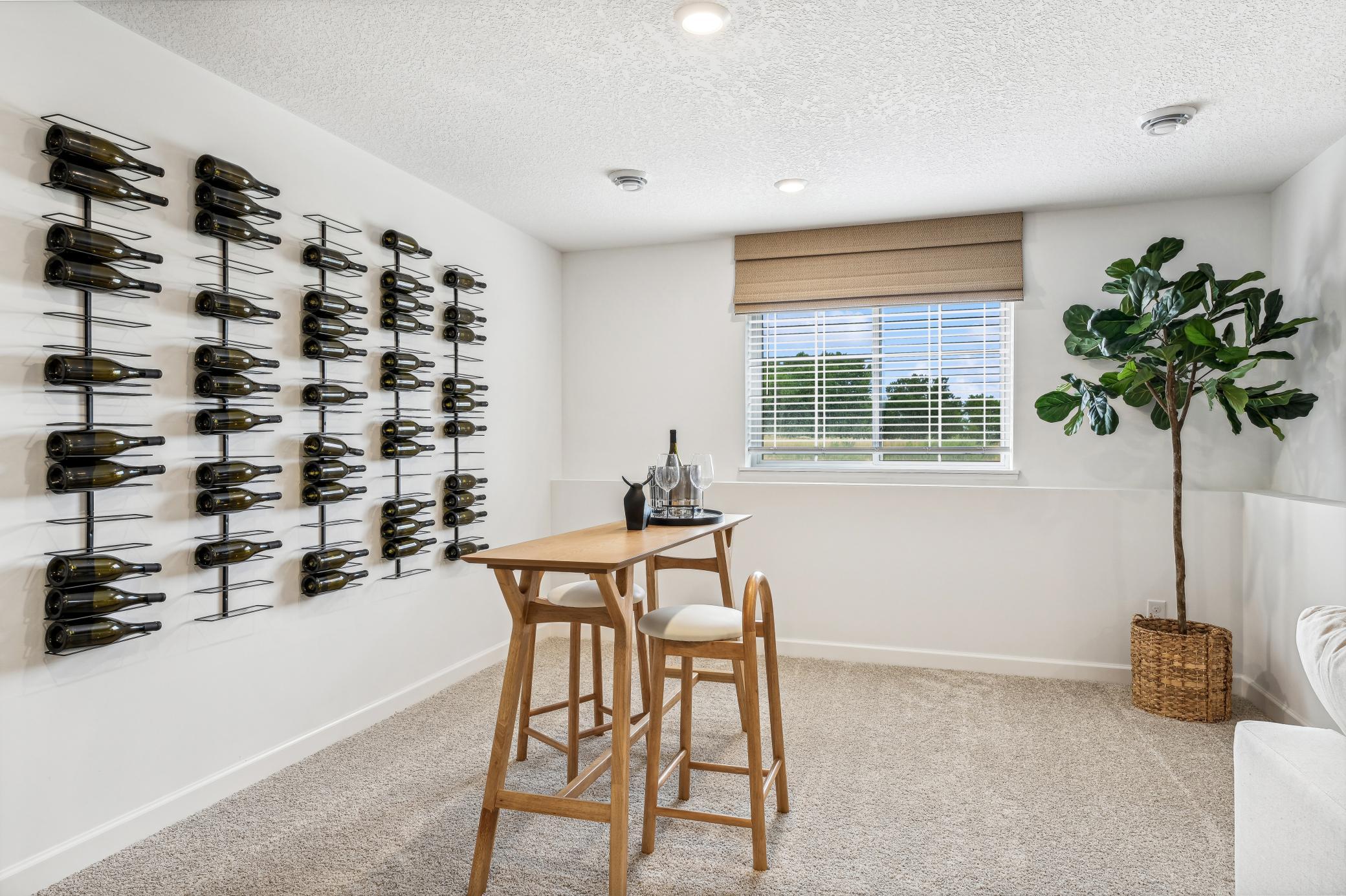 (Photo of a decorated model, actual homes finishes will vary) The recreation room.