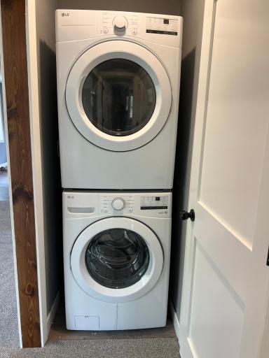 Laundry space with stackable frontload washer & Dryer