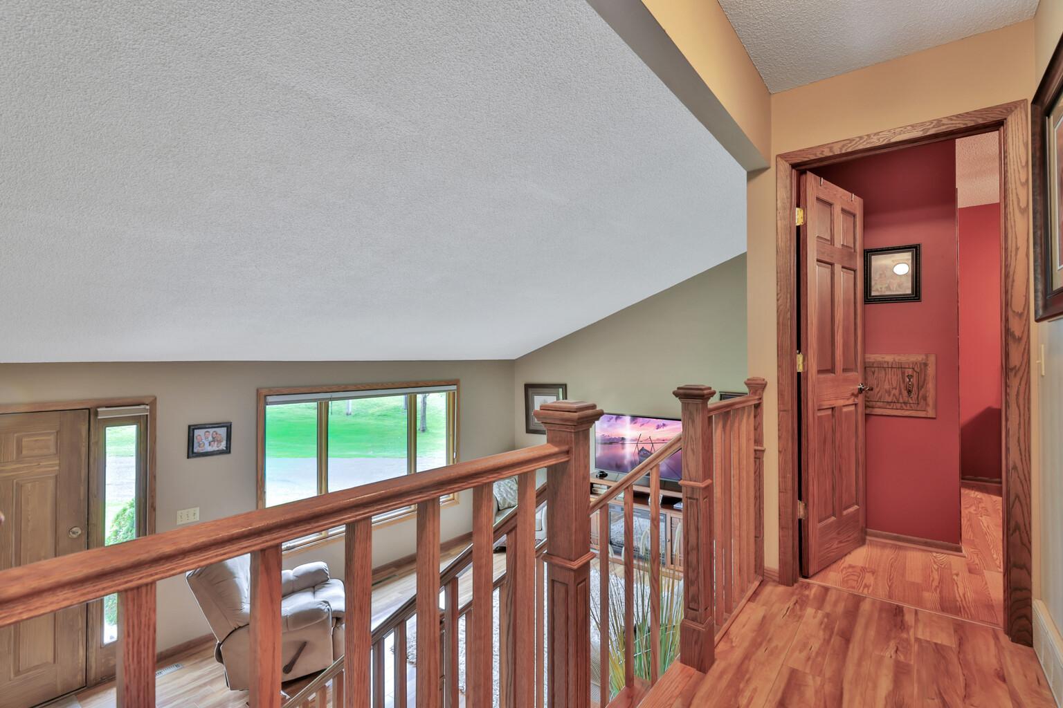 Upper level has 3 bedrooms and full bath with jetted tub