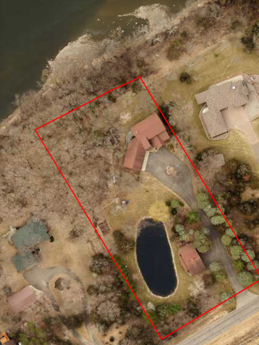 Aerial view of the lot with estimated lot lines when the trees have shed all of their foliage.