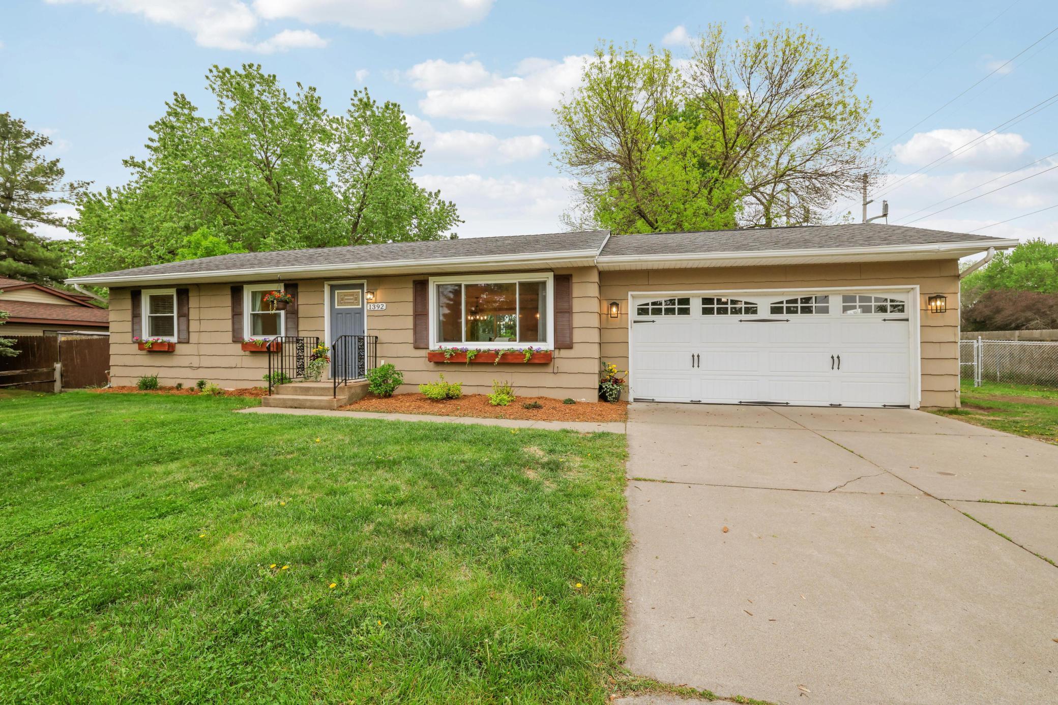 Newer garage door and accent flower boxes