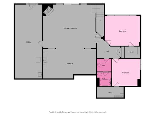 Expansive recreation room with wet bar, two additional bedrooms, full bath, generous storage, and direct access to the backyard and Lake Johanna.