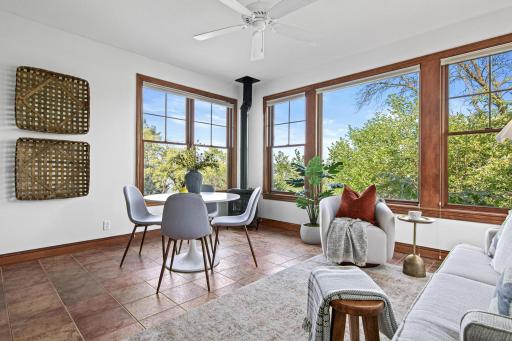 Imagine starting each morning in this sitting room that is attached to the primary bedroom overlooking the lake!