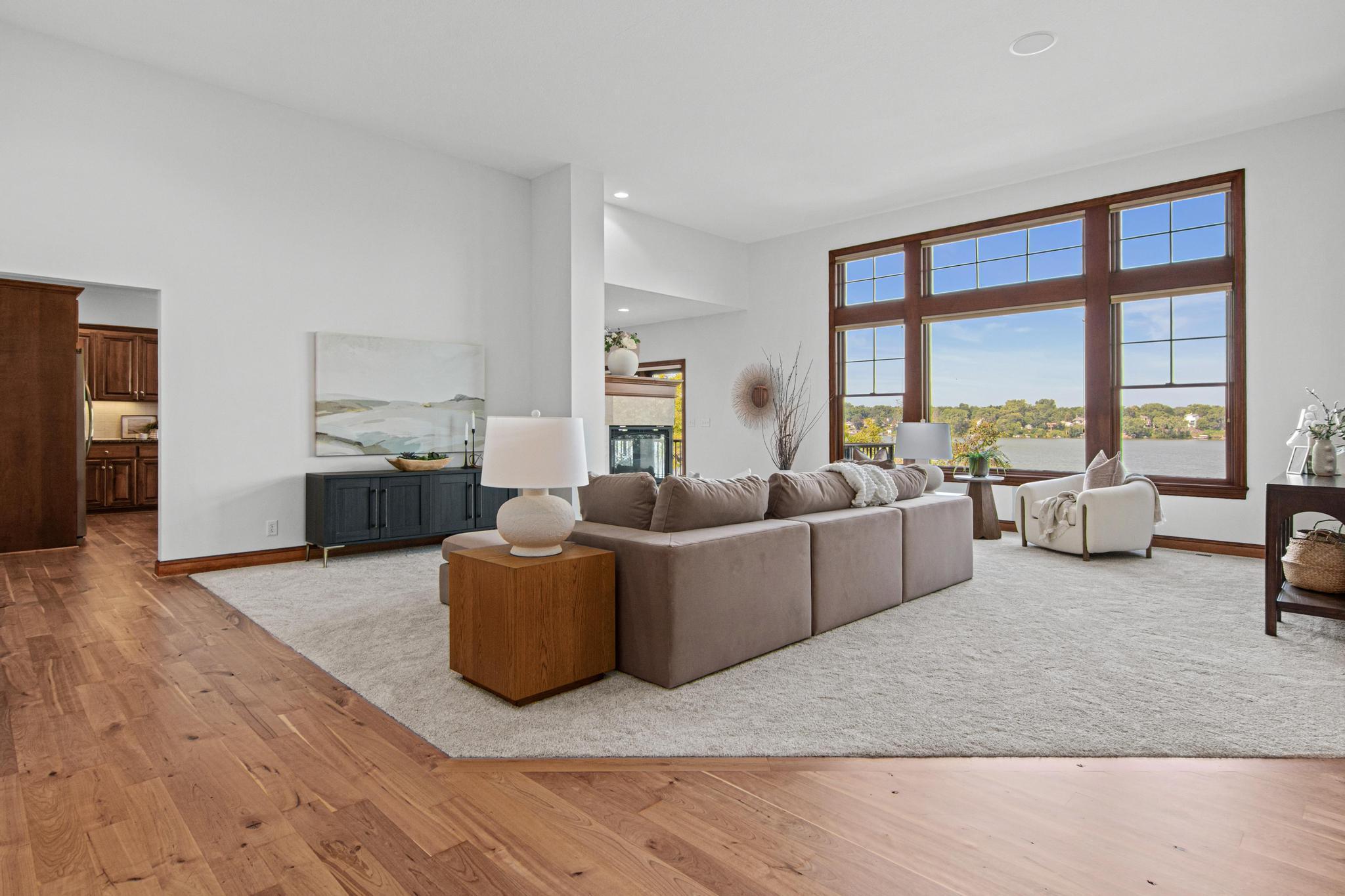 Once through the front door, you are greeted by massive windows overlooking Lake Johanna.