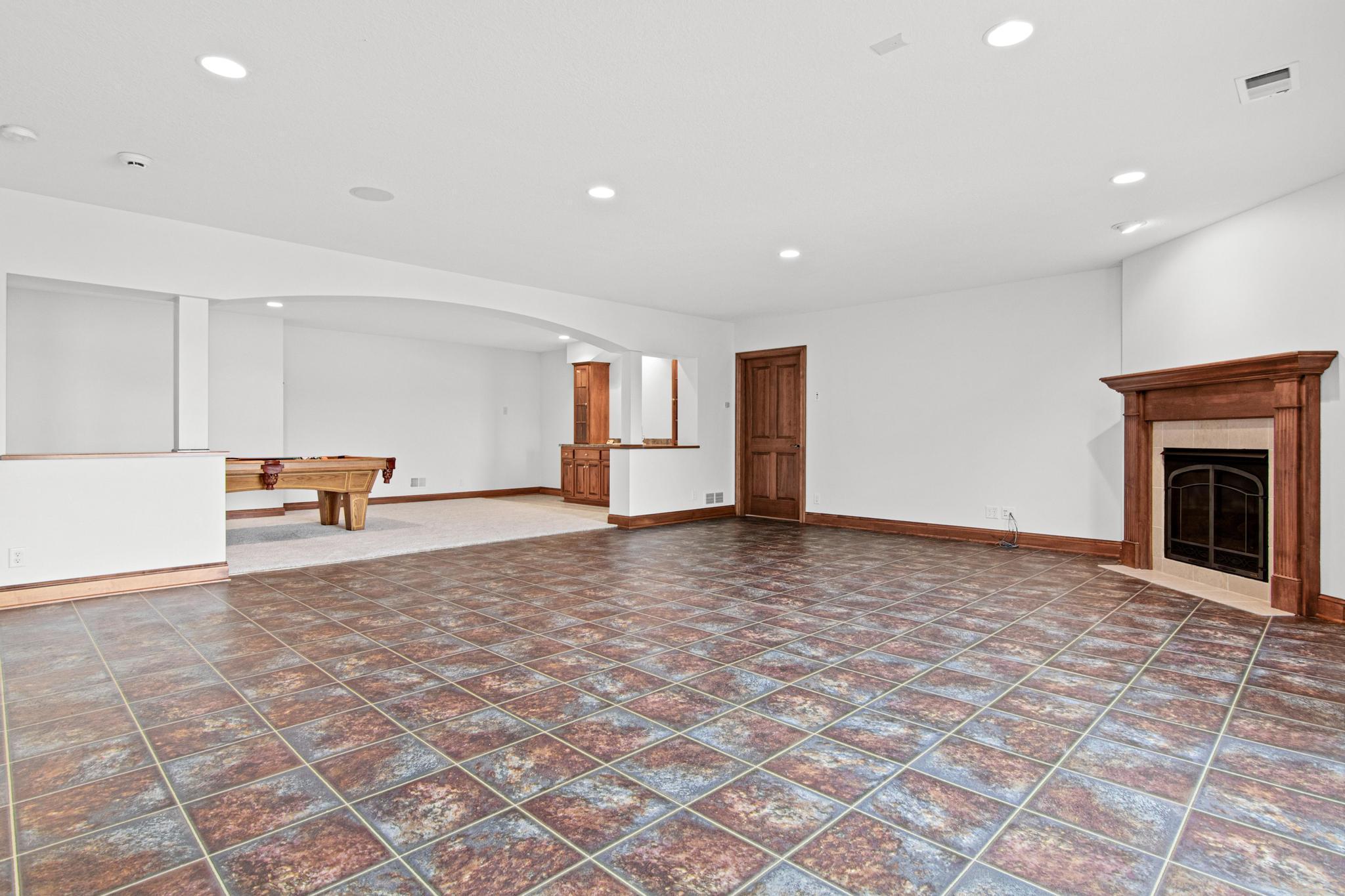 Open lower level recreation space for hosting family events, or weekly game nights - making memories that will last a lifetime.