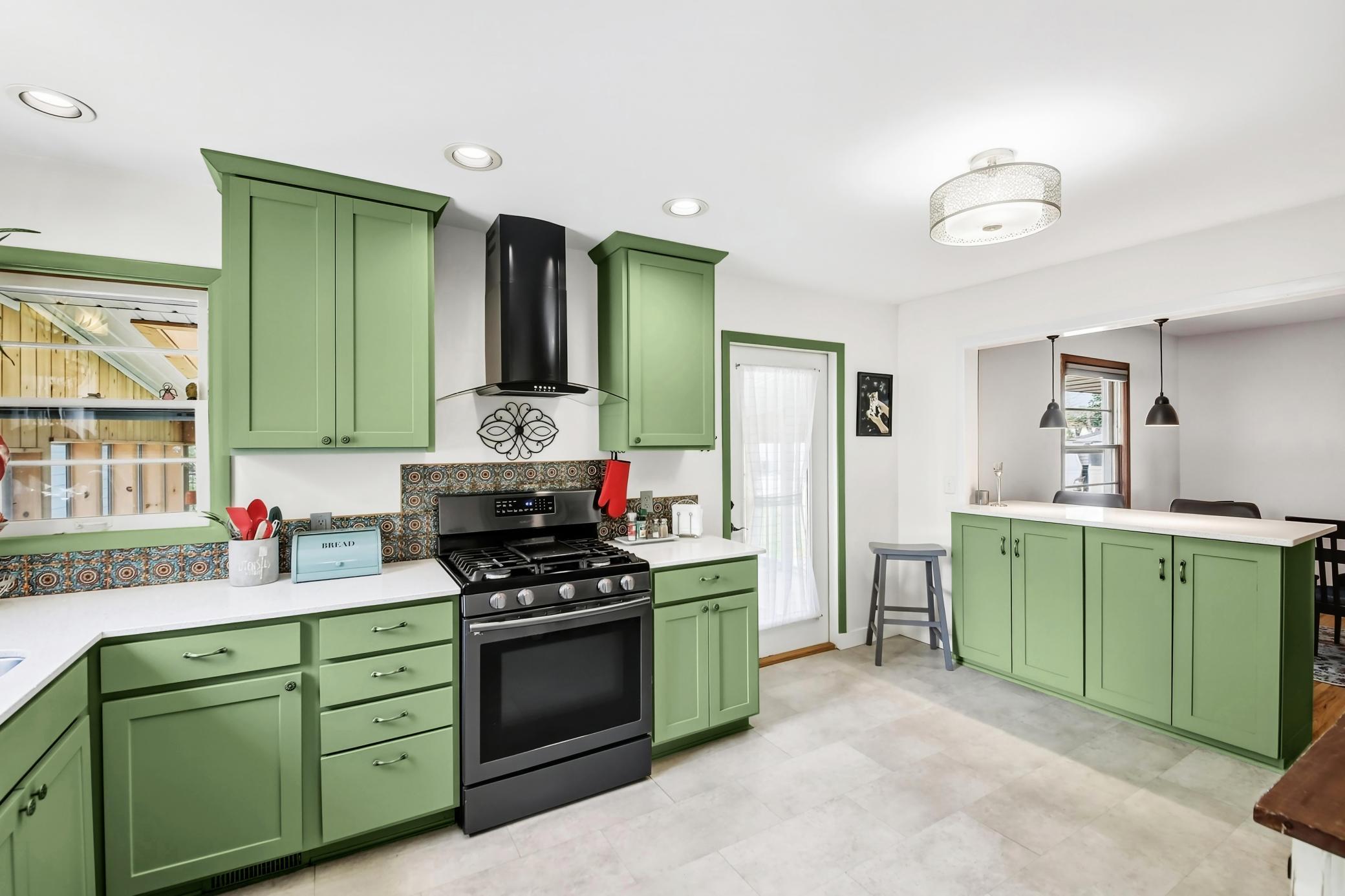 Adorable & charming kitchen, easy access & walk out to backyard & porch..jpg