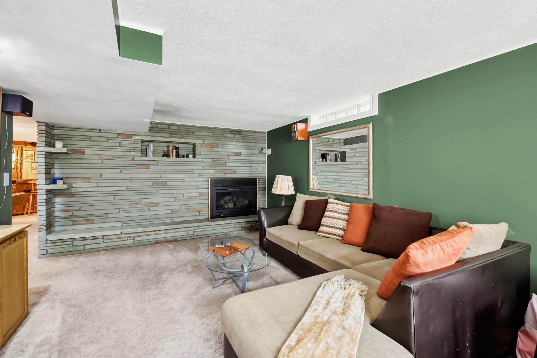 LL Modern Family Room Features Stone Accent Wall.jpg