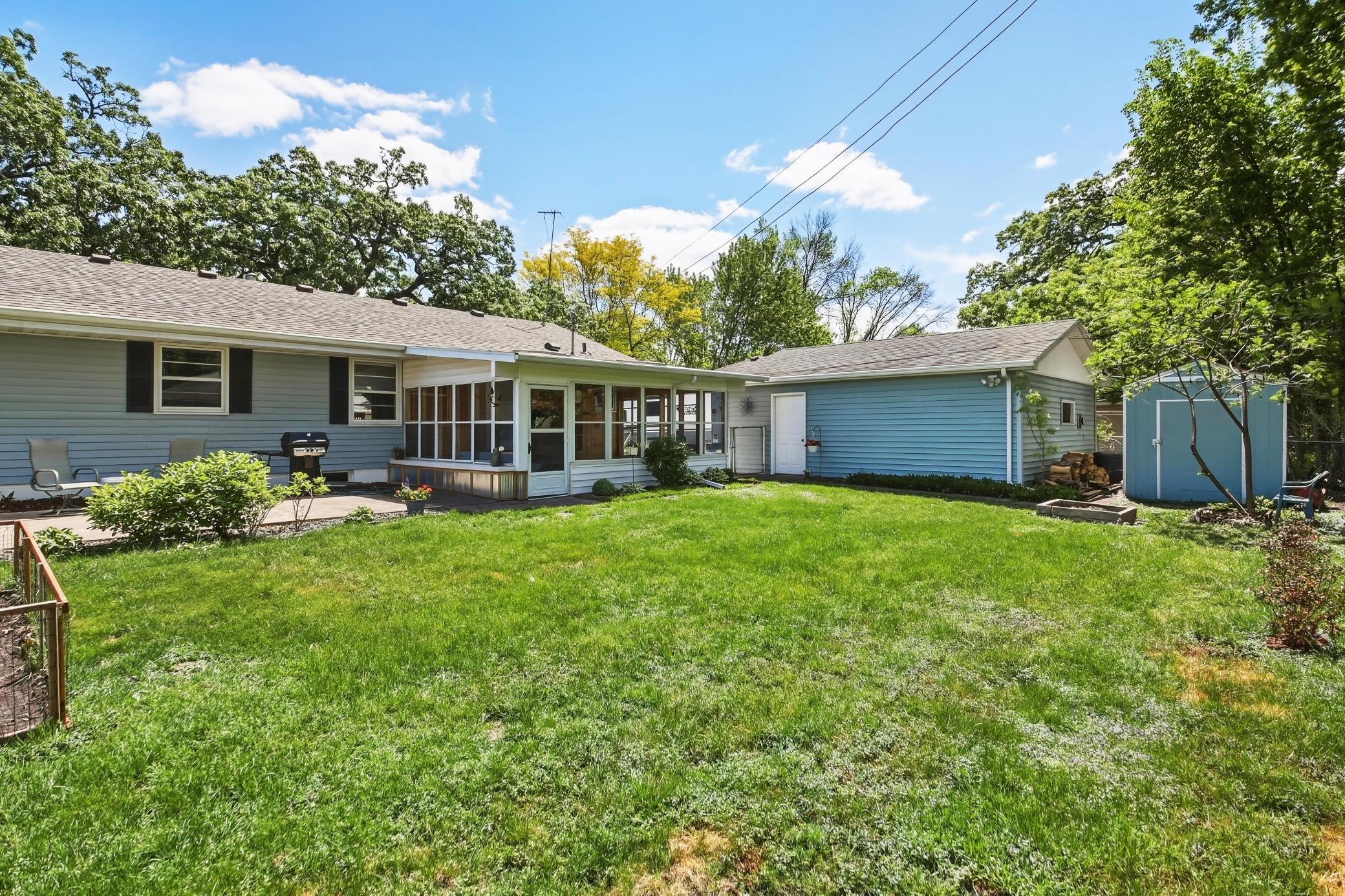 Backyard delight, serene & inviting atmosphere, lush greenery & trees.jpg