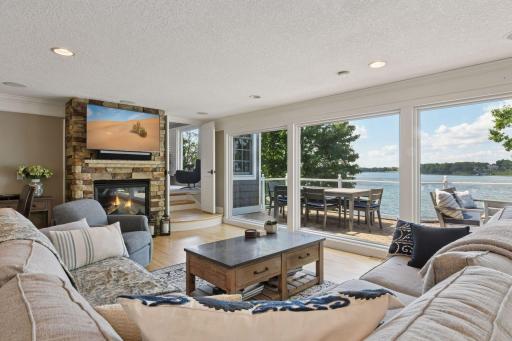 Designed for entertainingâcozy up by the stone fireplace or enjoy the built-in wet bar and walk-out paver patio.