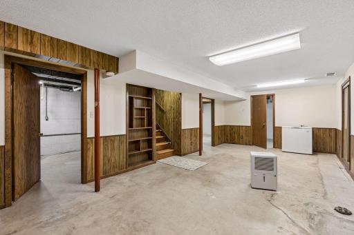 Large basement with two room and a photo developing room in laundry room