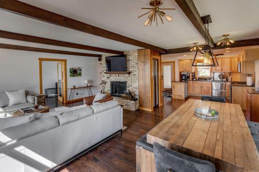 Comfortable living room with cozy wood burning fireplace.