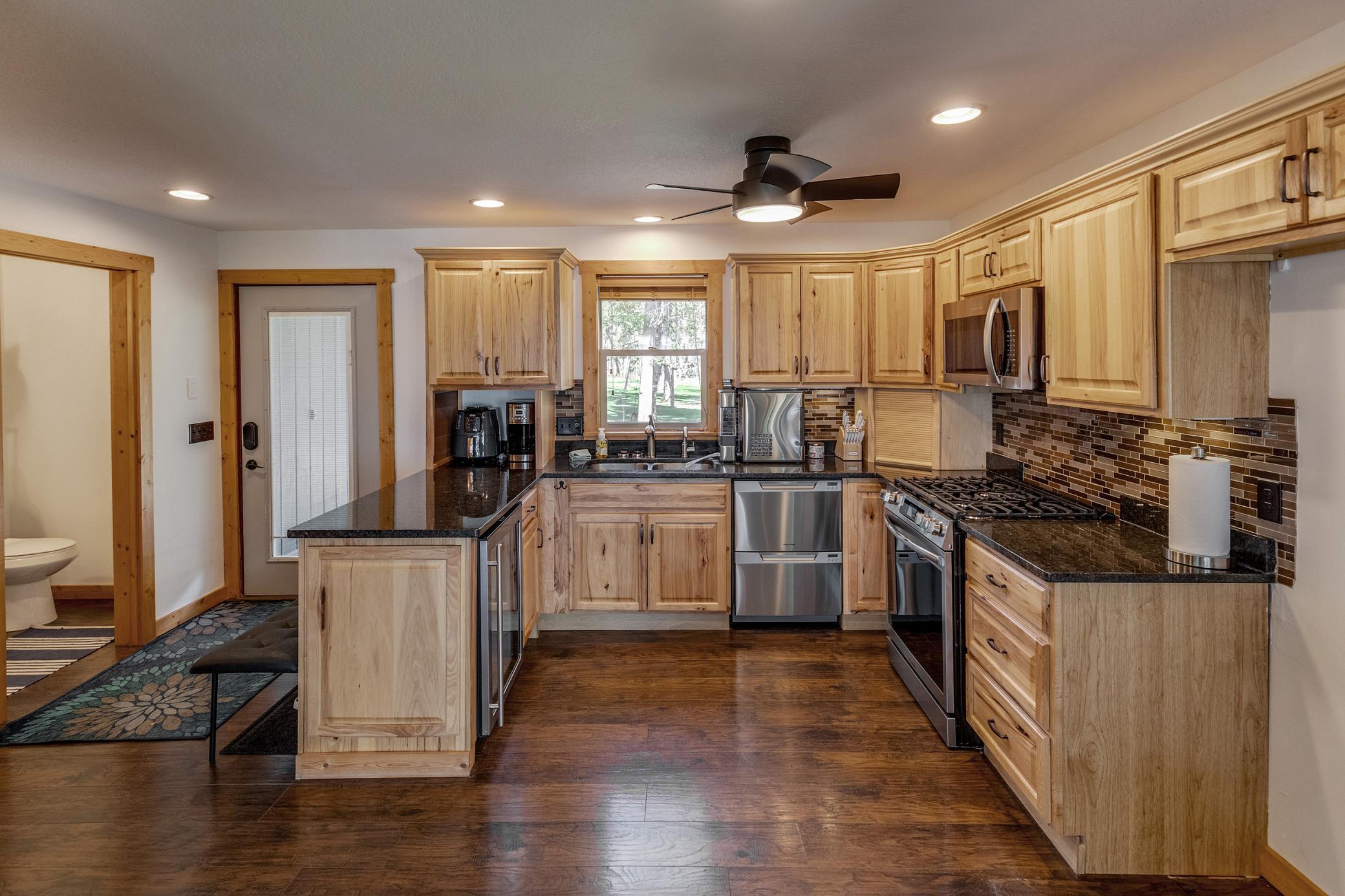 Brand new full size on order completes this well equipped kitchen