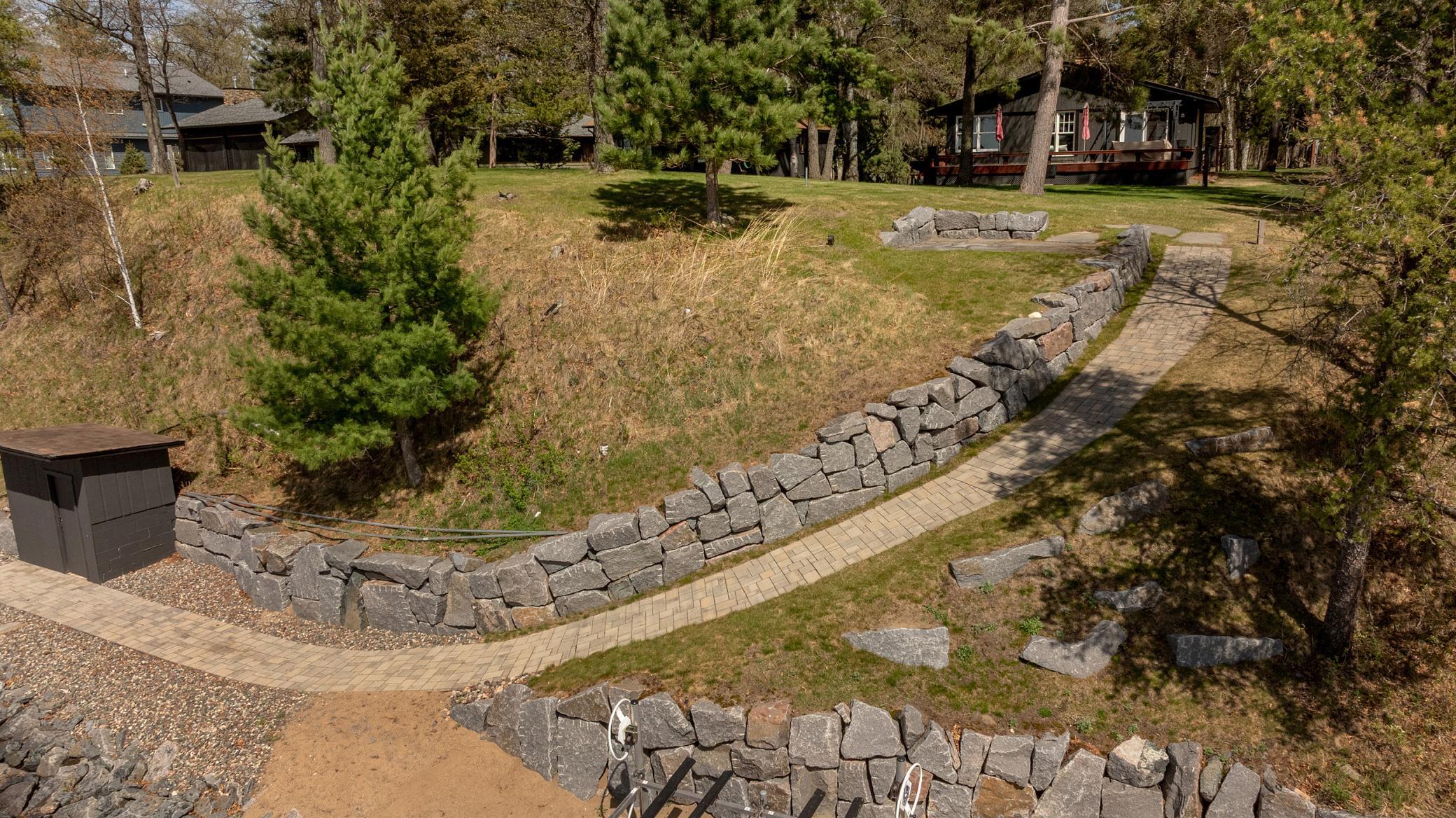Dig your toes in the sand! Beautiful place to enjoy the day. Paver patio is just witing for you and your cup of coffee.