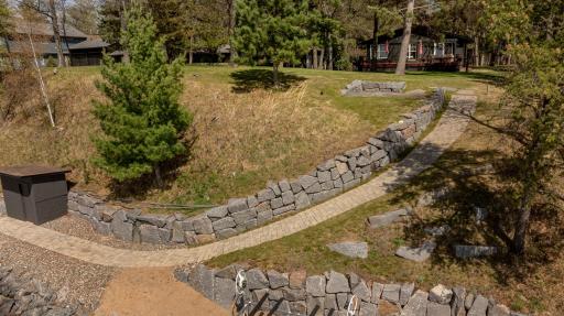Dig your toes in the sand! Beautiful place to enjoy the day. Paver patio is just witing for you and your cup of coffee.