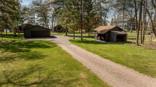 large garage and storage building for all of the toys. The storage building features a bunkroom.