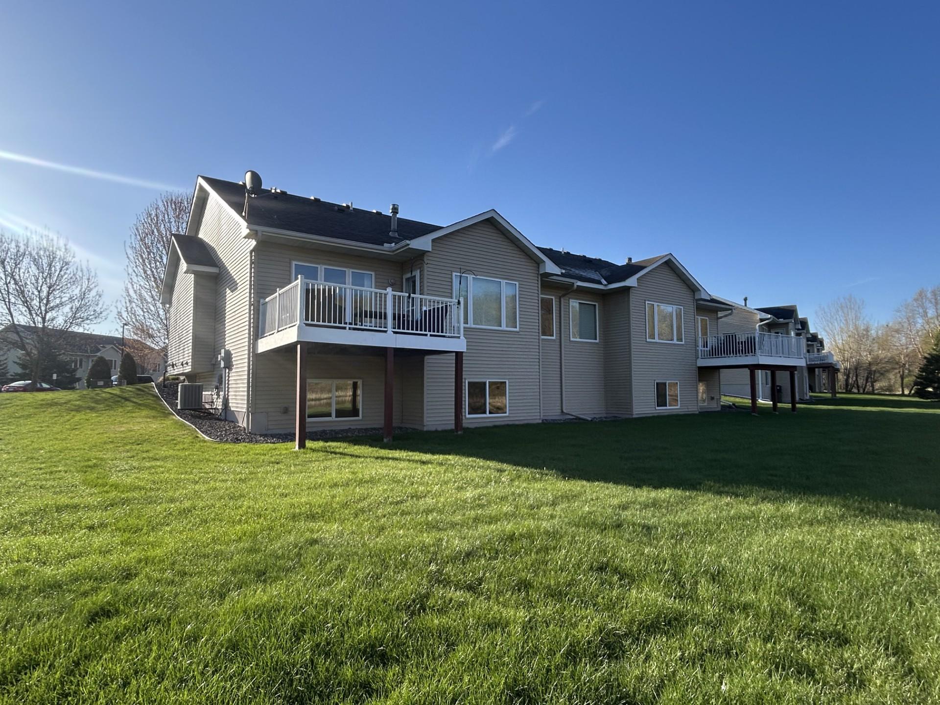 Back of home. The subject property is on the left side.