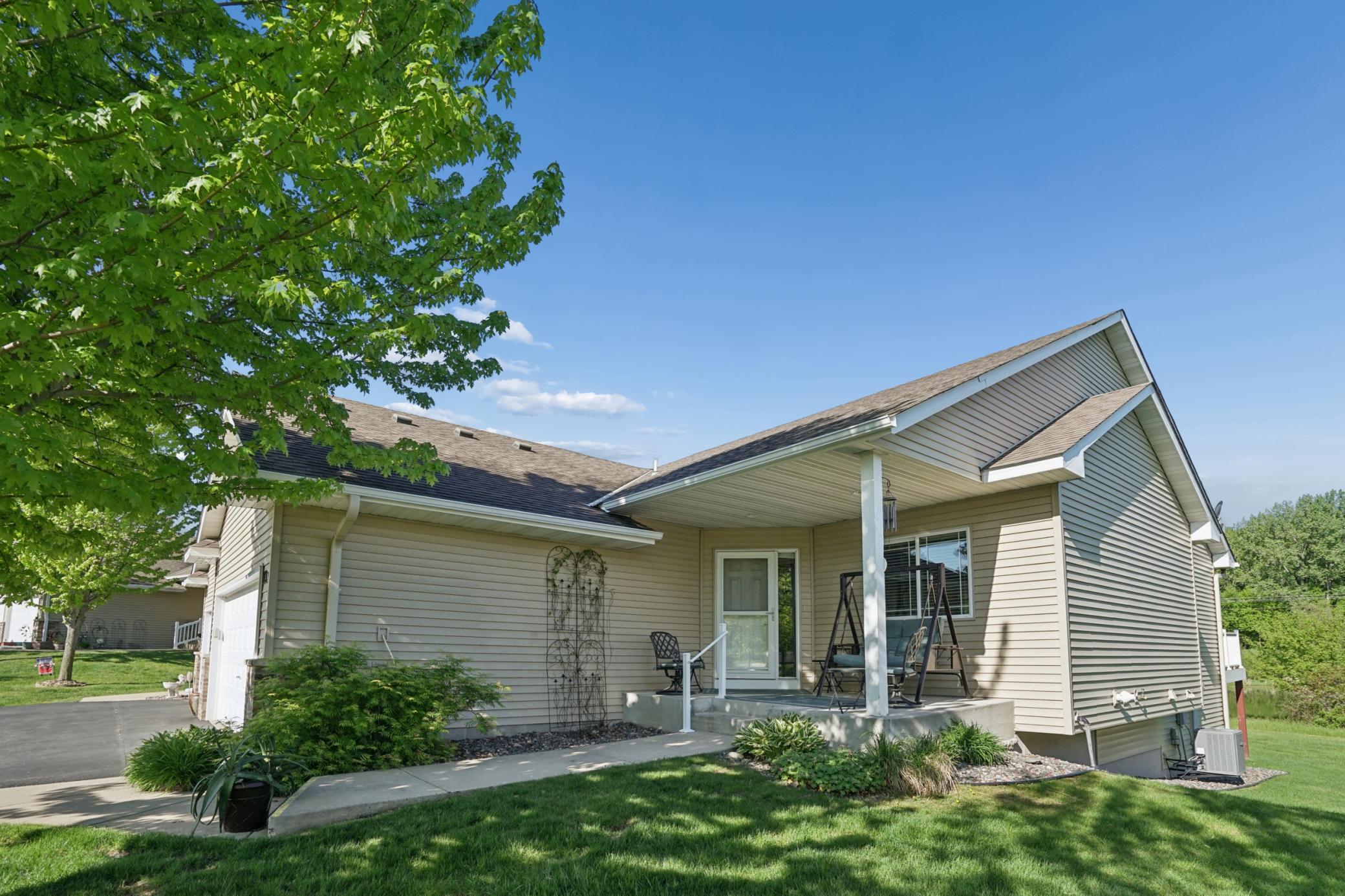 Covered porch and side of home.