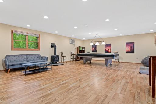 A dream space that can be used for parties, a large office, or anything your imagination can fill the area with. A game of pool is ready for you when you tour the home. Heated and AC in a wall mount for comfort all year round.
