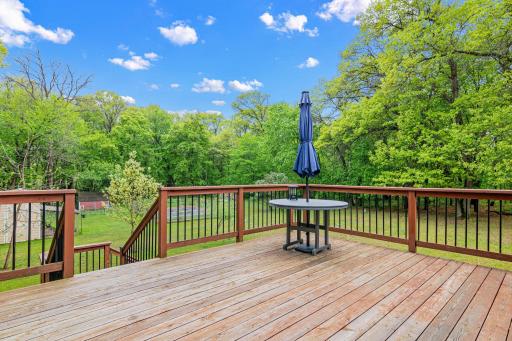 The Deck right off of the dining area gives you access to the back yard.