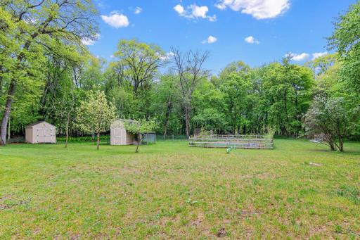 Garden that is fenced off, Chicken coop, Shed, and you have your own private wood behind your home!