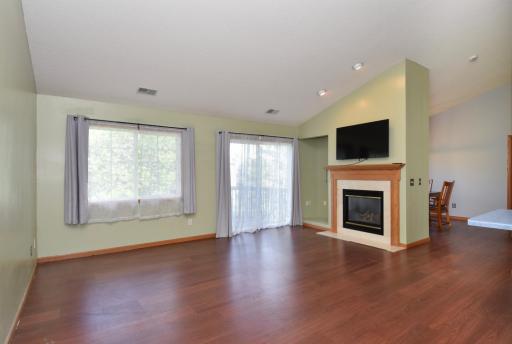 7559 derby large living room with gas fireplace and wall mounted tv.jpg