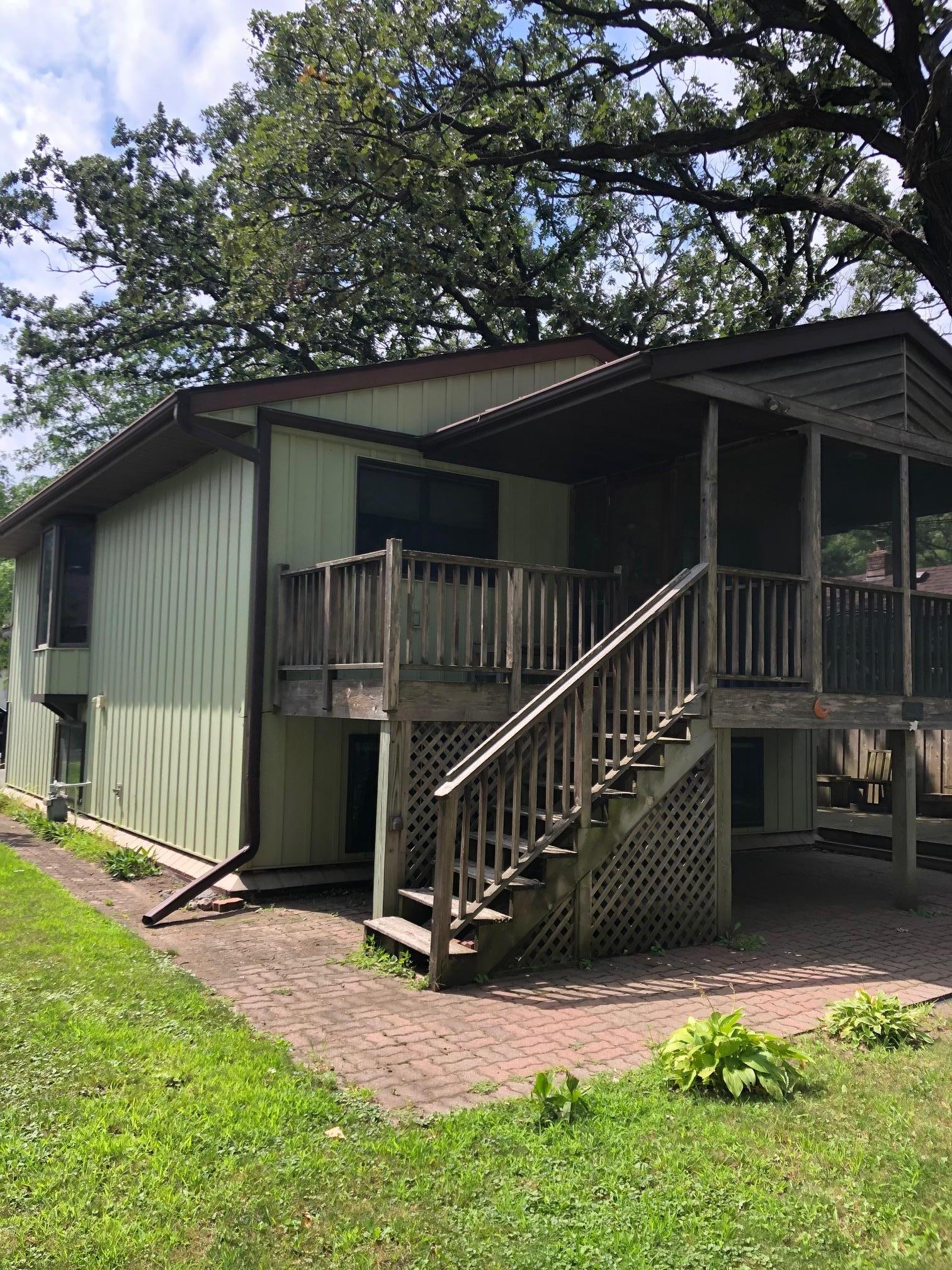 Deck, Screened in porch, and paver patio! Note - Seller has updated some deck boards and the railing since this photo was taken.