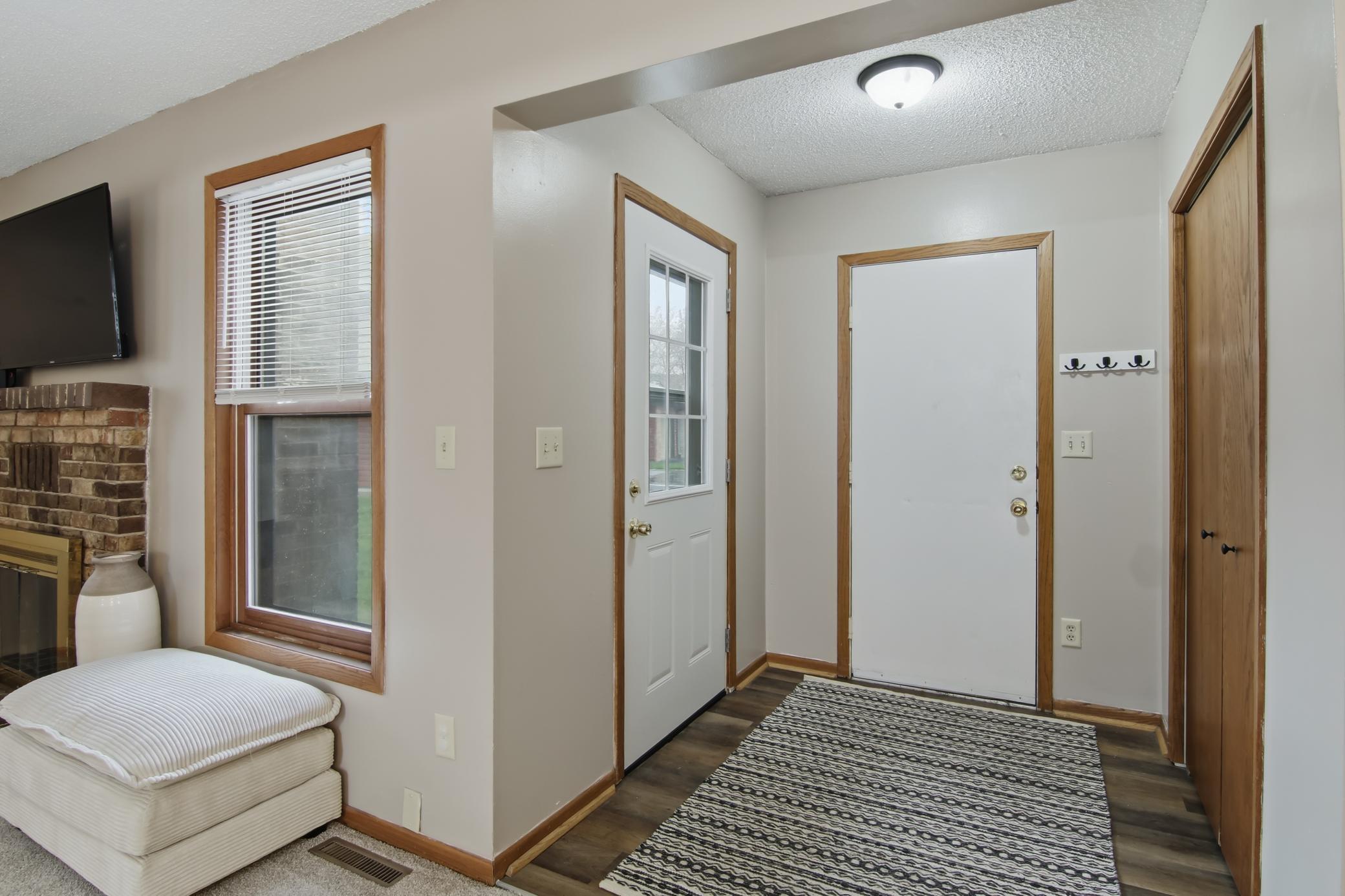 A spacious foyer area with large closet.