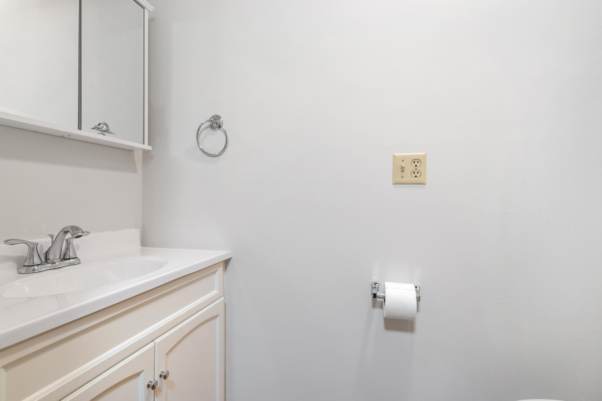 Main level 1/2 bath perfect for guests and everyday use.