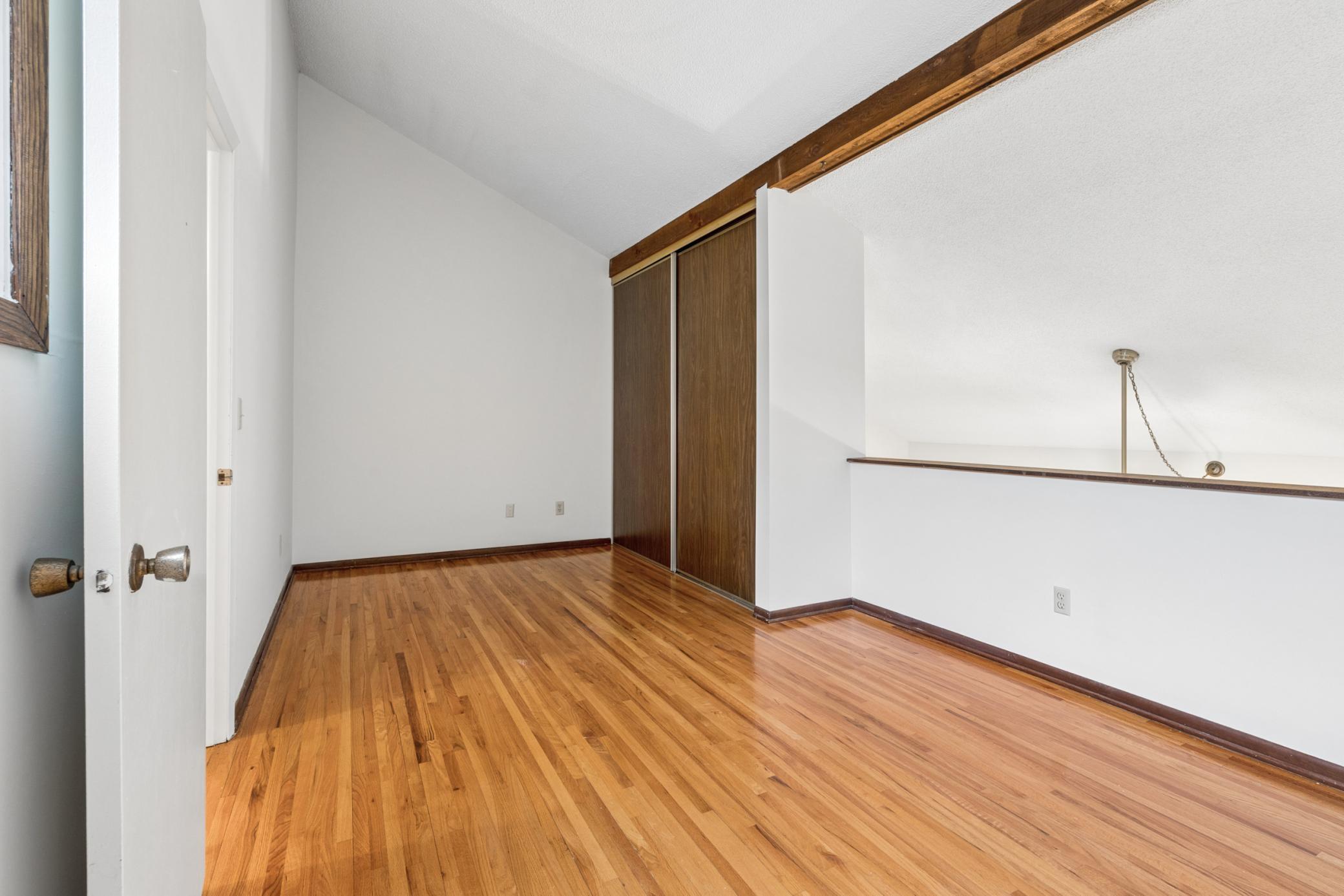Convenient storage keeps overflow belongings neatly organized and tucked away.