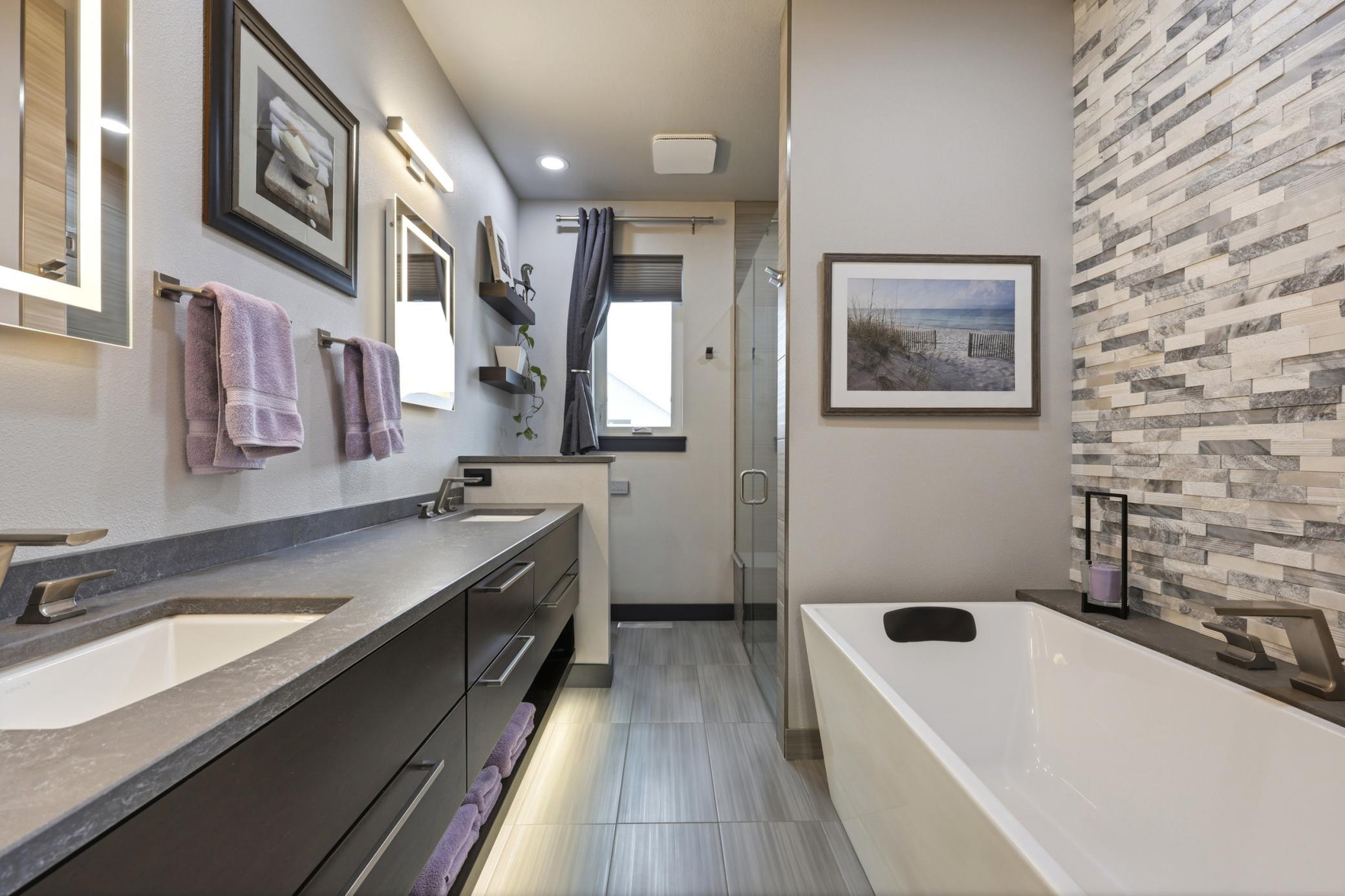 primary private bath, toe kick lighting, soaker tub, tile walk in