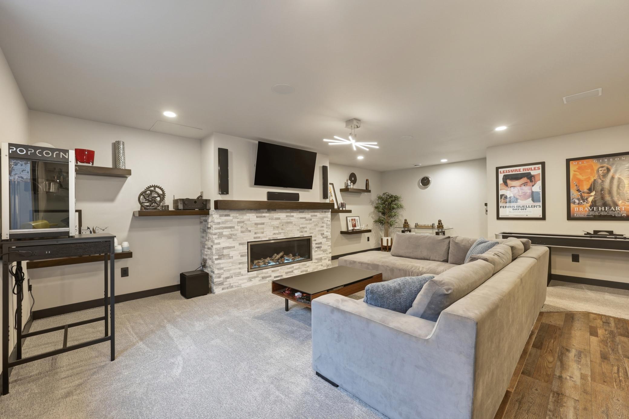 family room with custom fireplace, surround sound