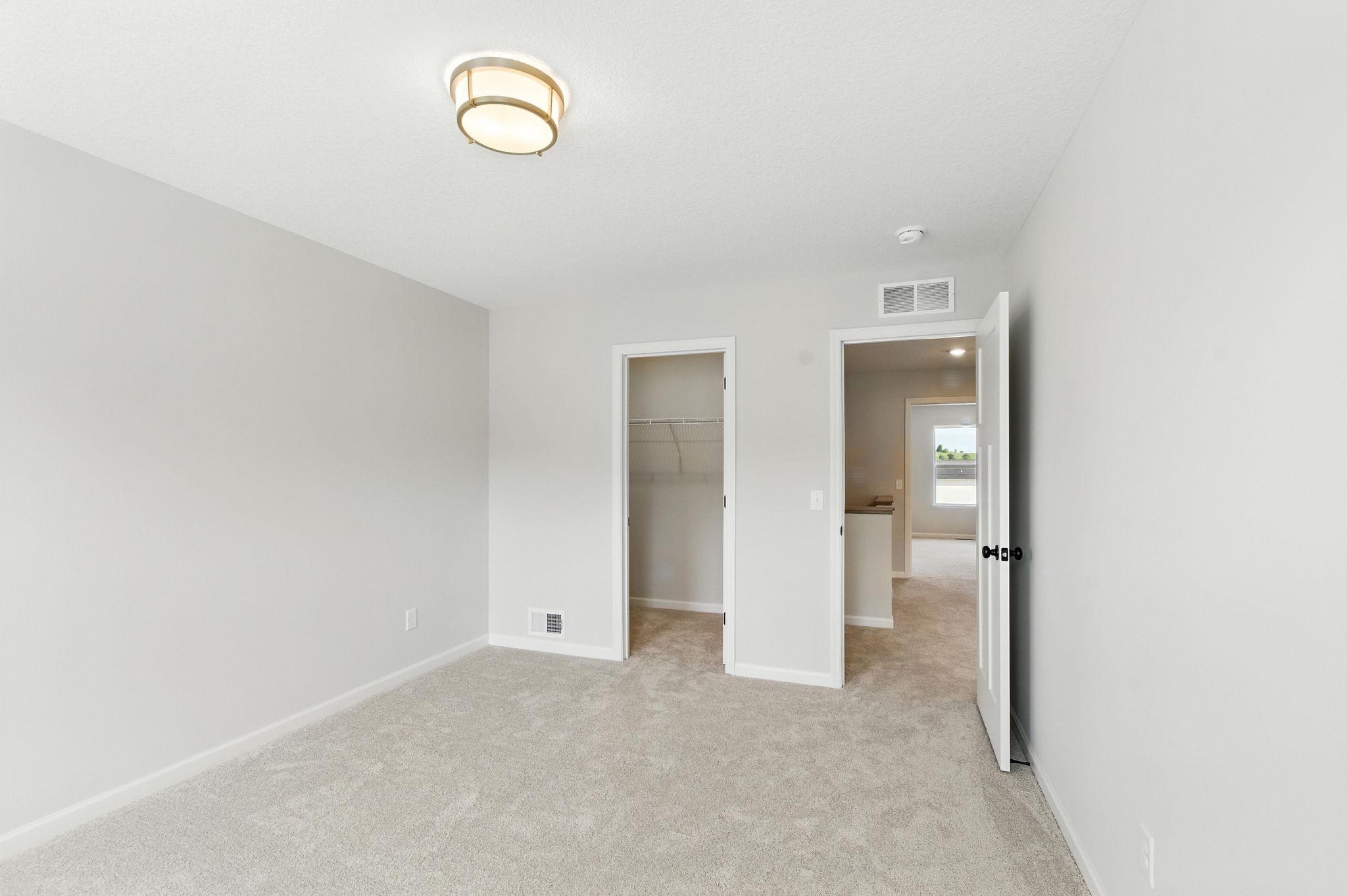 Second Bedroom (Photo of similar home - Colors and selections will vary)