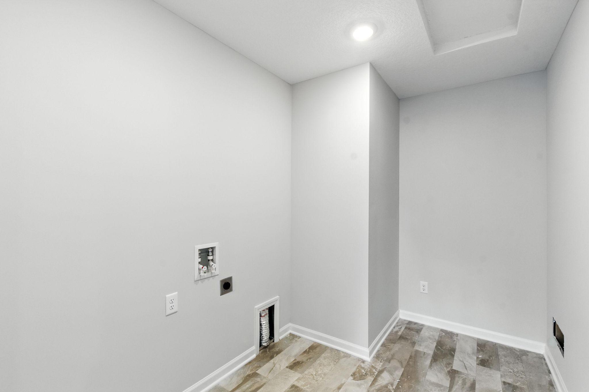 Laundry Room - Washer & Dryer Included (Photo of similar home - Colors and selections will vary)