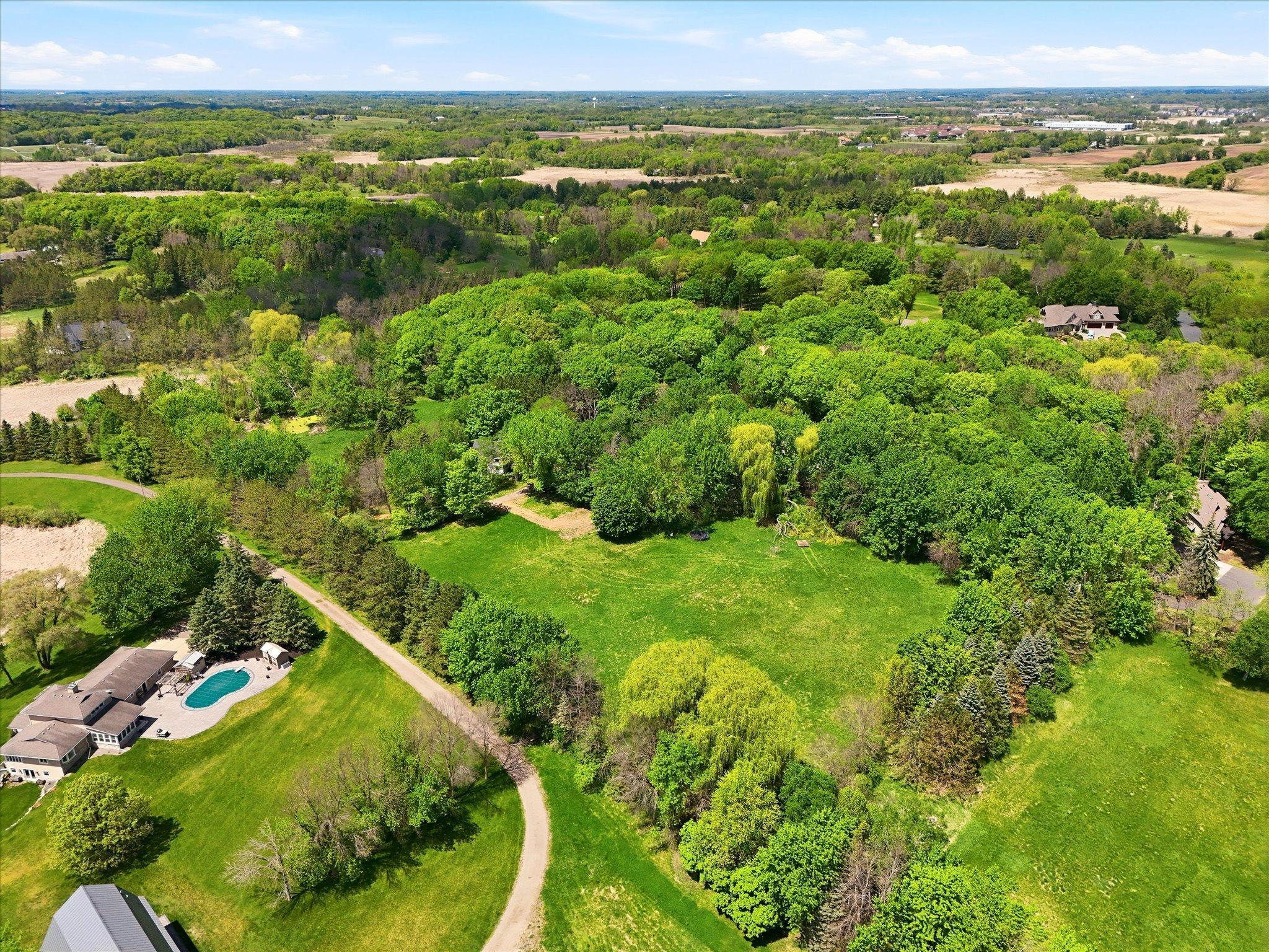 Absolutely stunning property for your new home site. Acreage estate with treelined private drive to a piece of heaven. *Existing home is approved for ADU/guest house - modifications to complete with your builder. Survey available