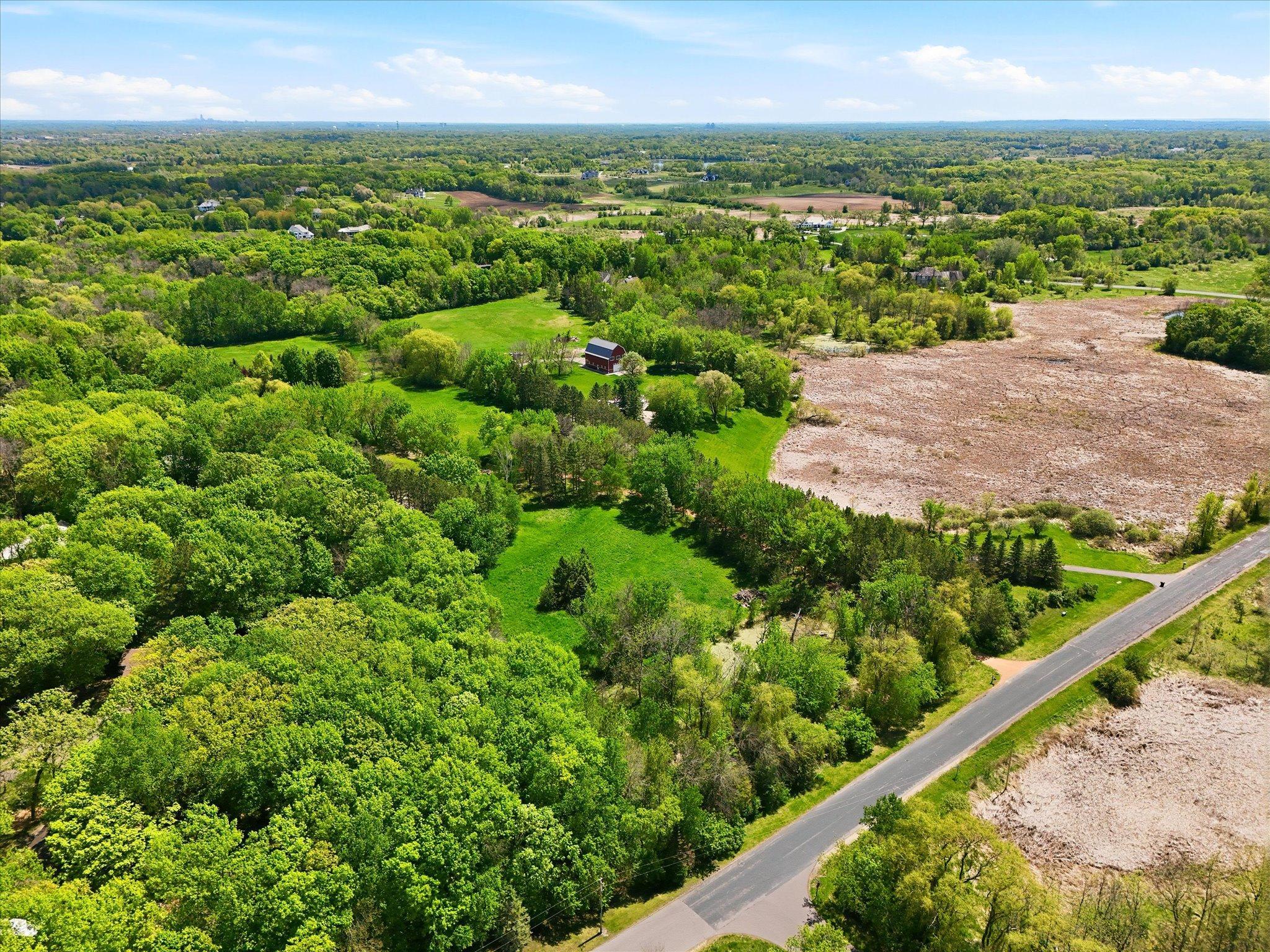 Absolutely stunning property for your new home site. Acreage estate with treelined private drive to a piece of heaven.