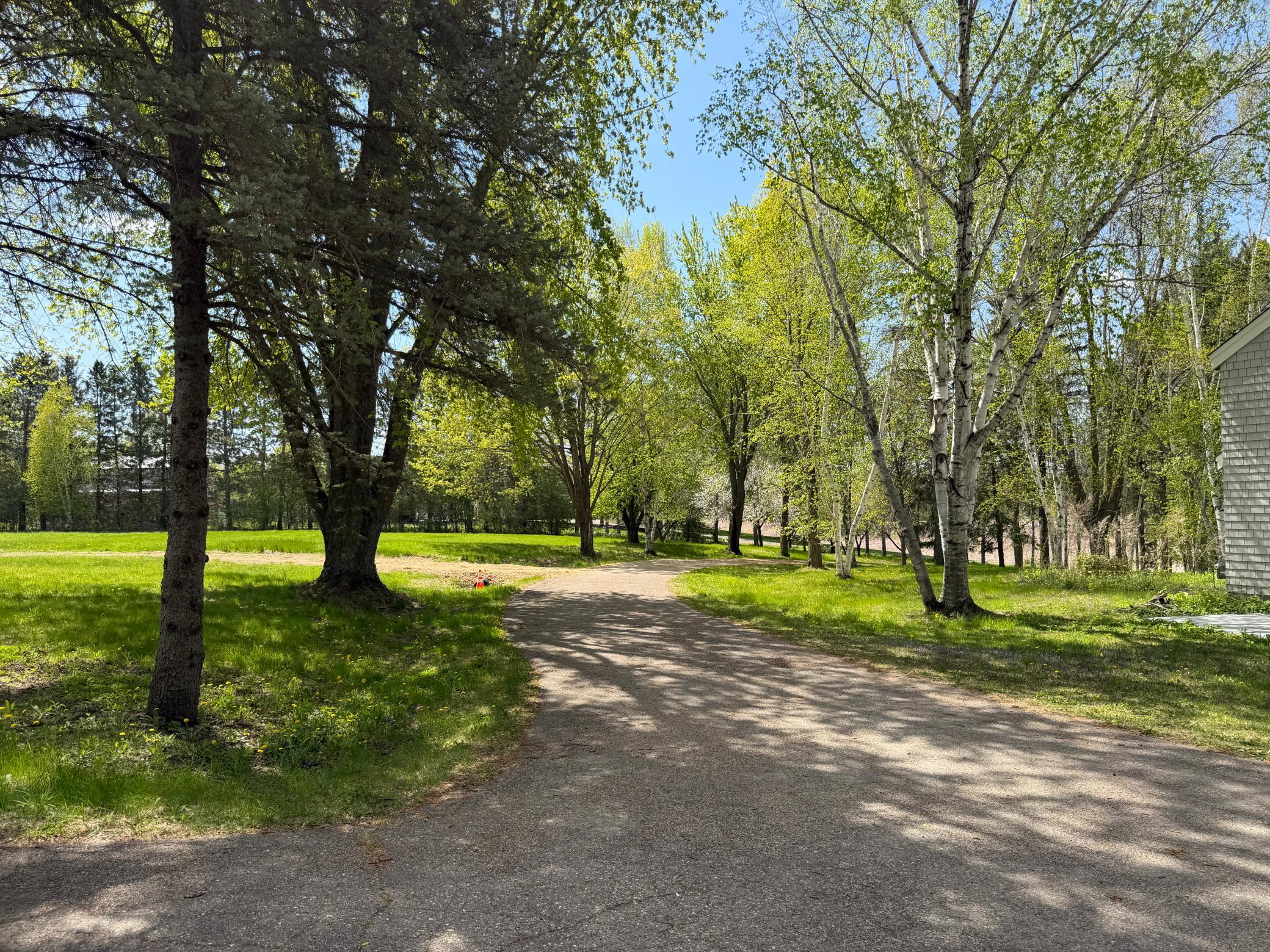 Treelined private drive to your own piece of heaven on almost 7 acres. Existing home on site already approved for ADU/guest house.